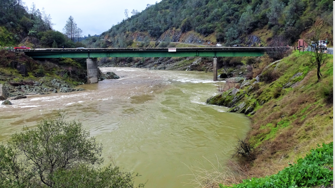 Why are barrels hanging above the American River?
