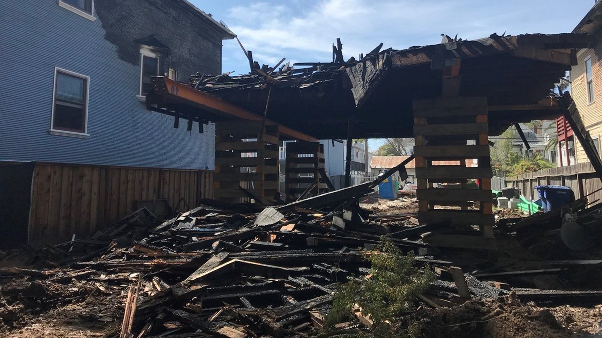 Neighbors have their own suspicions regarding what happened in their neighborhoods when two houses owned by the same property owner went up in flames. Fire officials say they're considering all causes and not ruling out arson in the investigation.