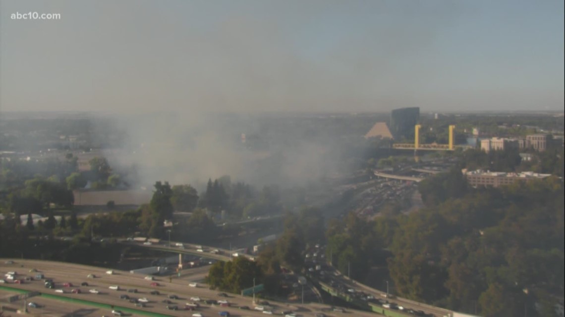 Grass fire brings smoke, traffic congestion to downtown 