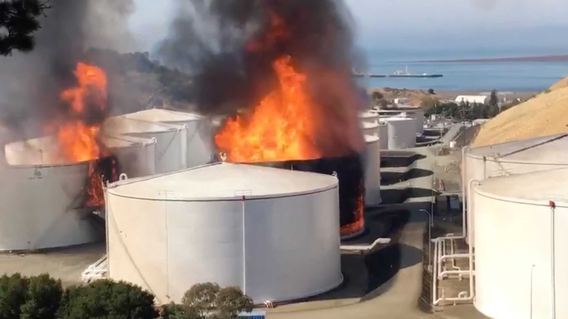 The fire at the NuStar facility in the East Bay has been contained, but, crews will still be putting water and foam on the area throughout the night.