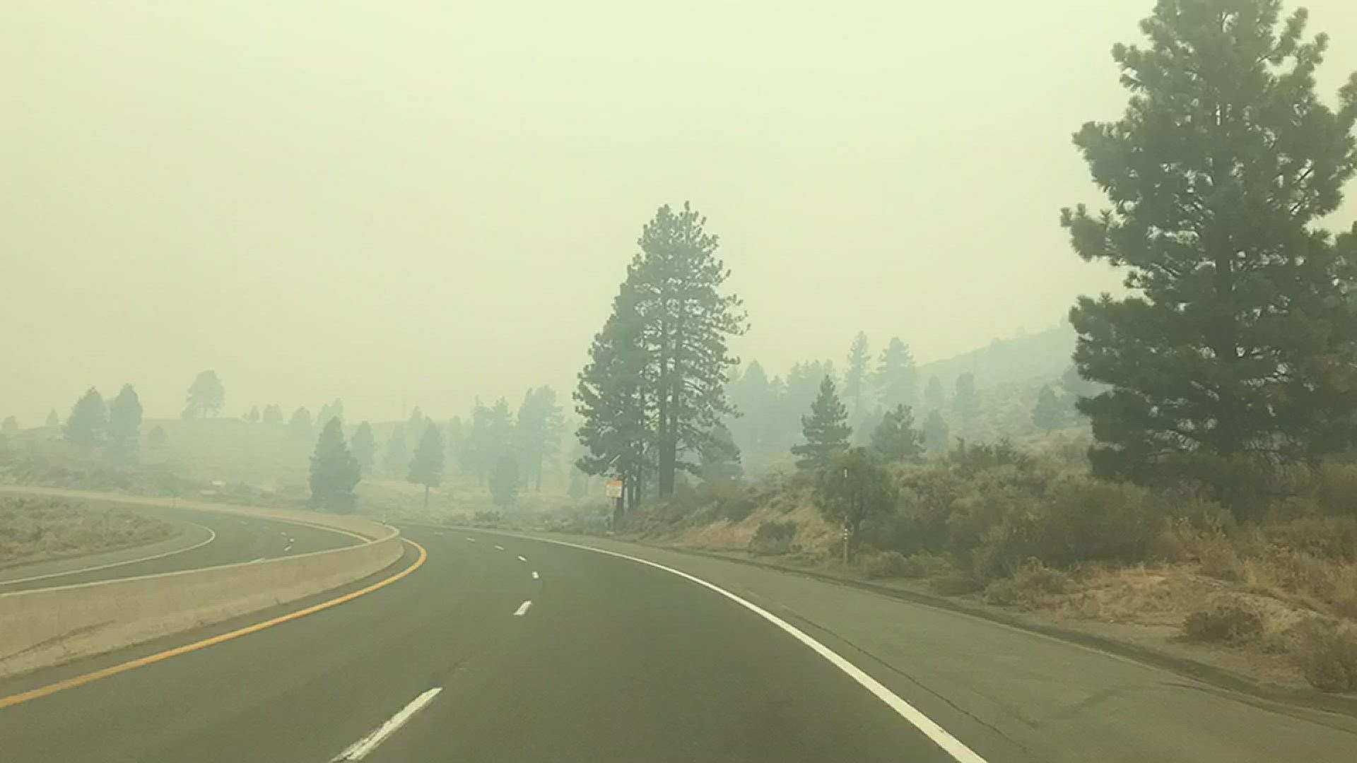 ABC10 reporter Bianca Buono showcases a smoky drive from Carson City toward South Lake Tahoe along a closed Highway 50.