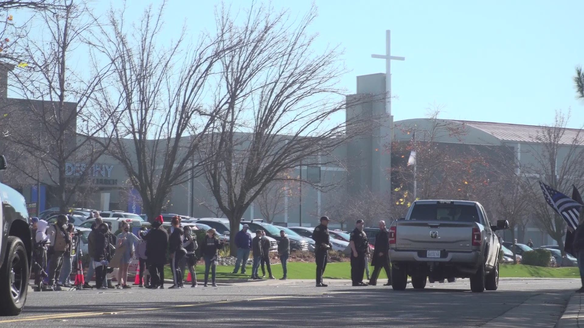 Protesters gathered to highlight Destiny Christian Church's defiance of public health orders, while also claiming a pastor has been making homophobic comments.