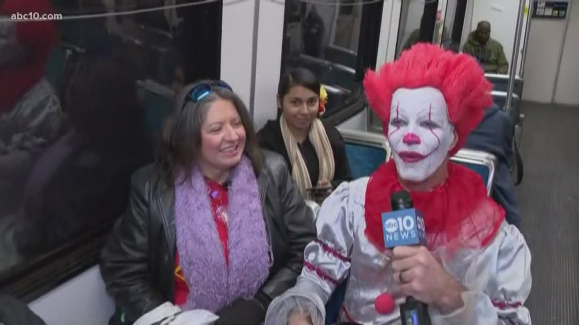 Mark S. Allen jumps on light rail in Sacramento to hand out Halloween candy, laughs and scares.