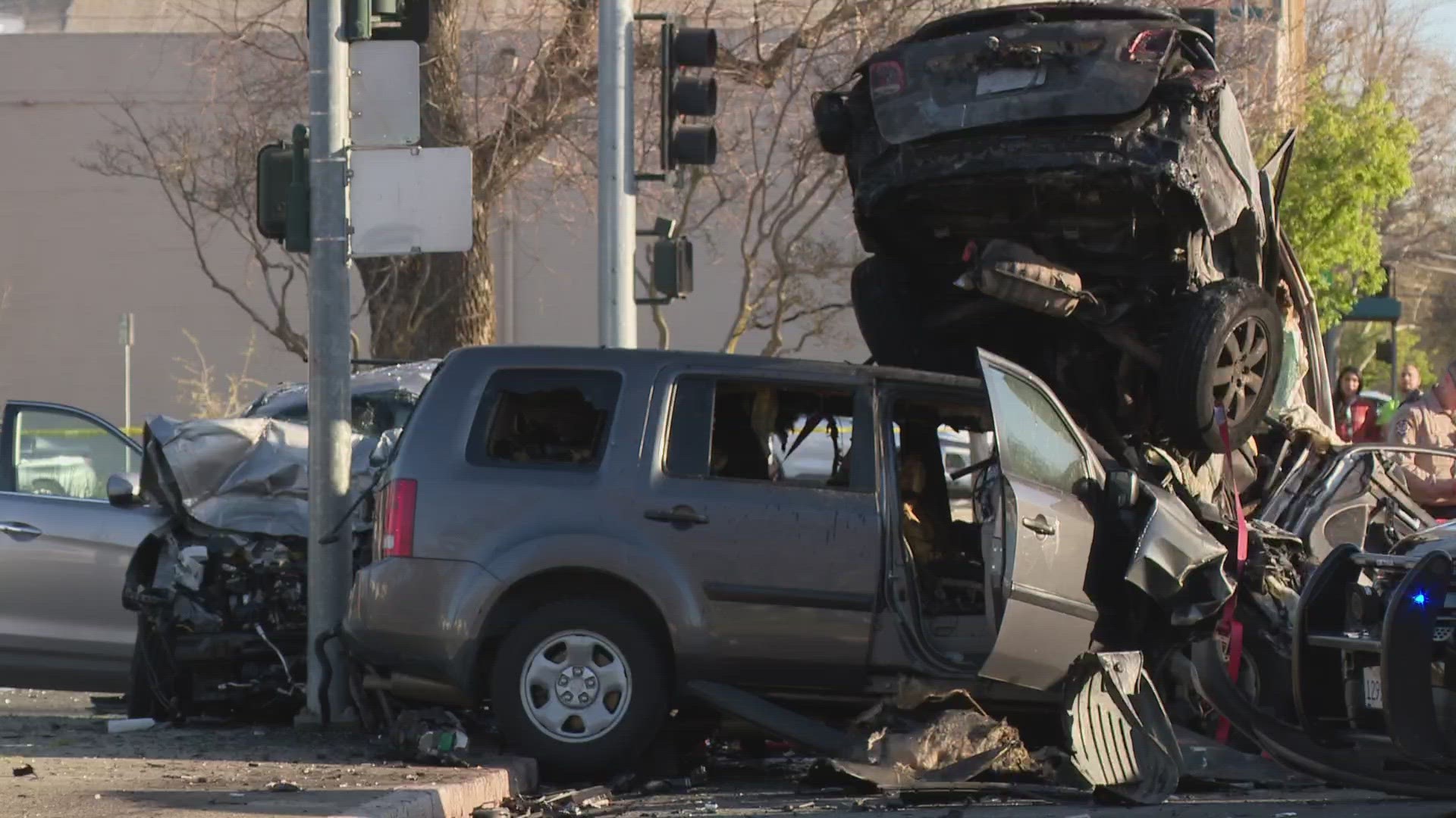 Officials say the crash started after a car was seen by an officer "driving erratically" through downtown Woodland.