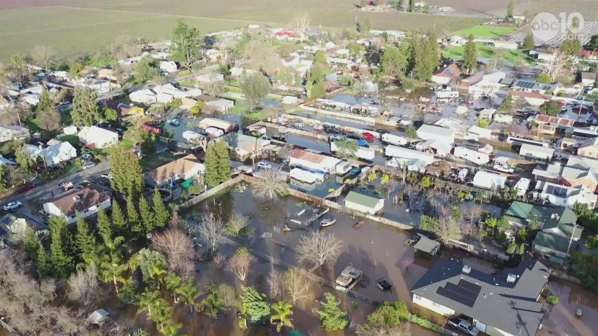 Arbor Mobile Home Park fell under an evacuation warning Sunday evening after nearly half the park was dealing with floodwaters.