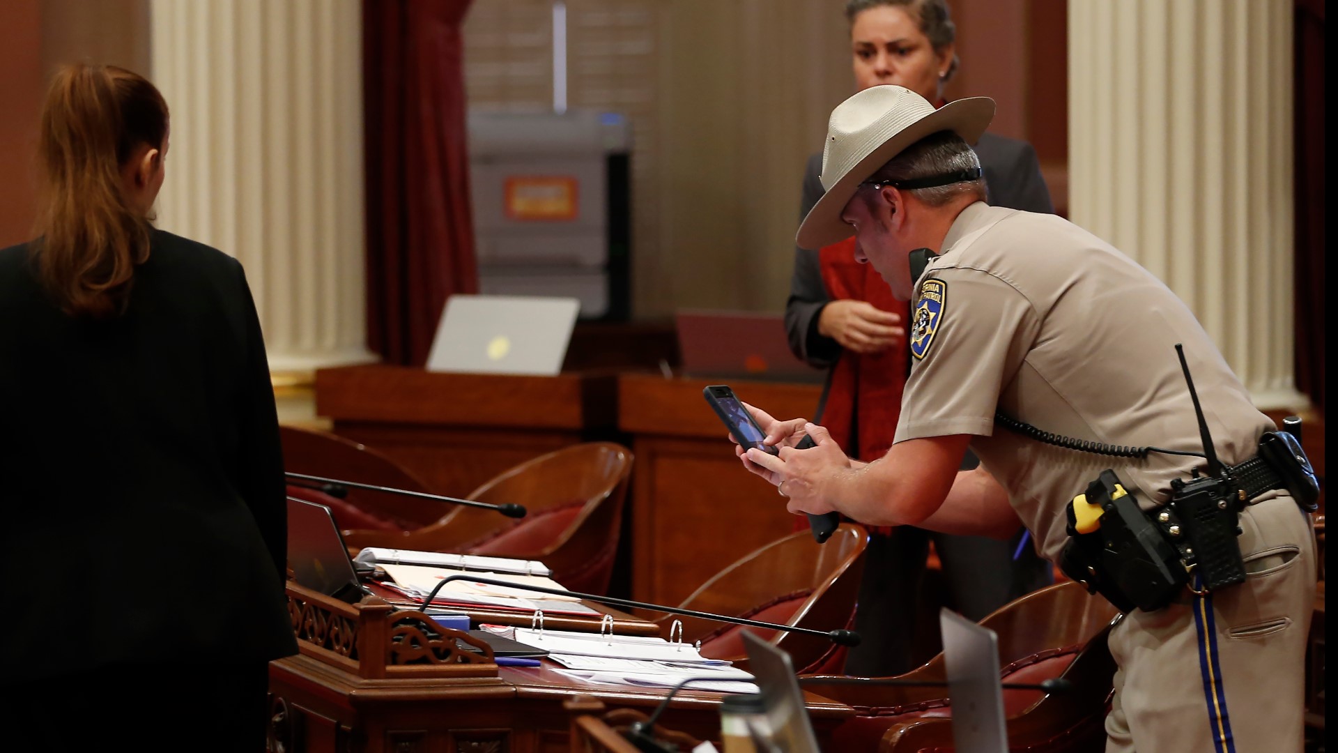 One woman has been arrested after the California Highway Patrol said she threw what appeared to be blood onto the Senate floor. The incident caused the Senate floor and gallery to close.