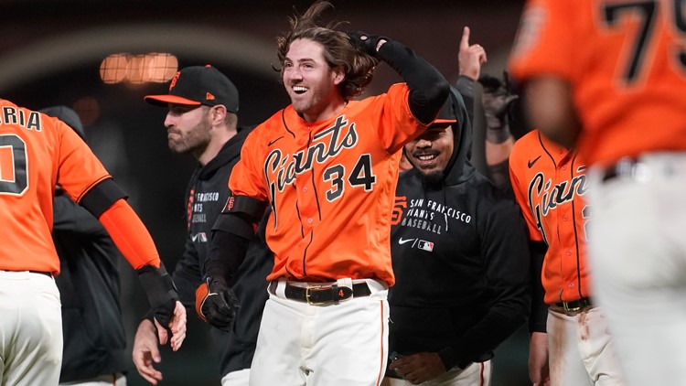 San Francisco, California, USA. 17th Sep, 2021. The SF Giants celebrate San  Francisco Giants pinch hitter pitcher Kevin Gausman's (34) sacrifice fly  that drove in the winning run, during a MLB baseball