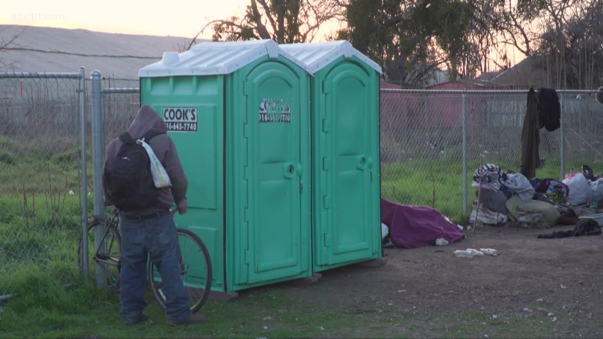 A fight over toilets is making its way to federal court after a group of homeless people filed a restraining order to prevent the city from removing porta-potties.