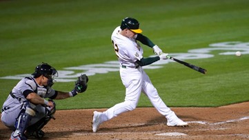 A's pound Tigers, back Manaea's 1st victory of season, 8-4