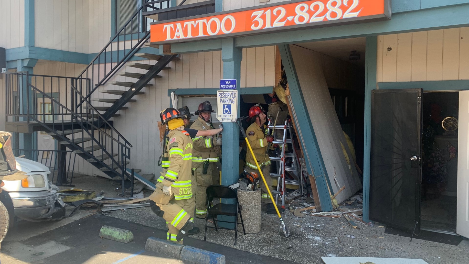 Orangevale accident Car crashes into tattoo shop