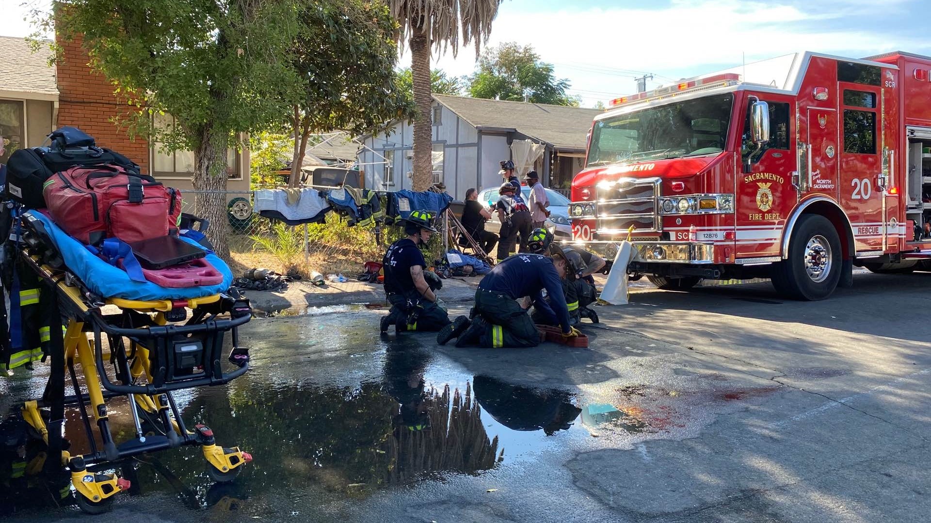 A vegetation fire in North Sacramento has displaced residents of about a dozen homes Tuesday afternoon.