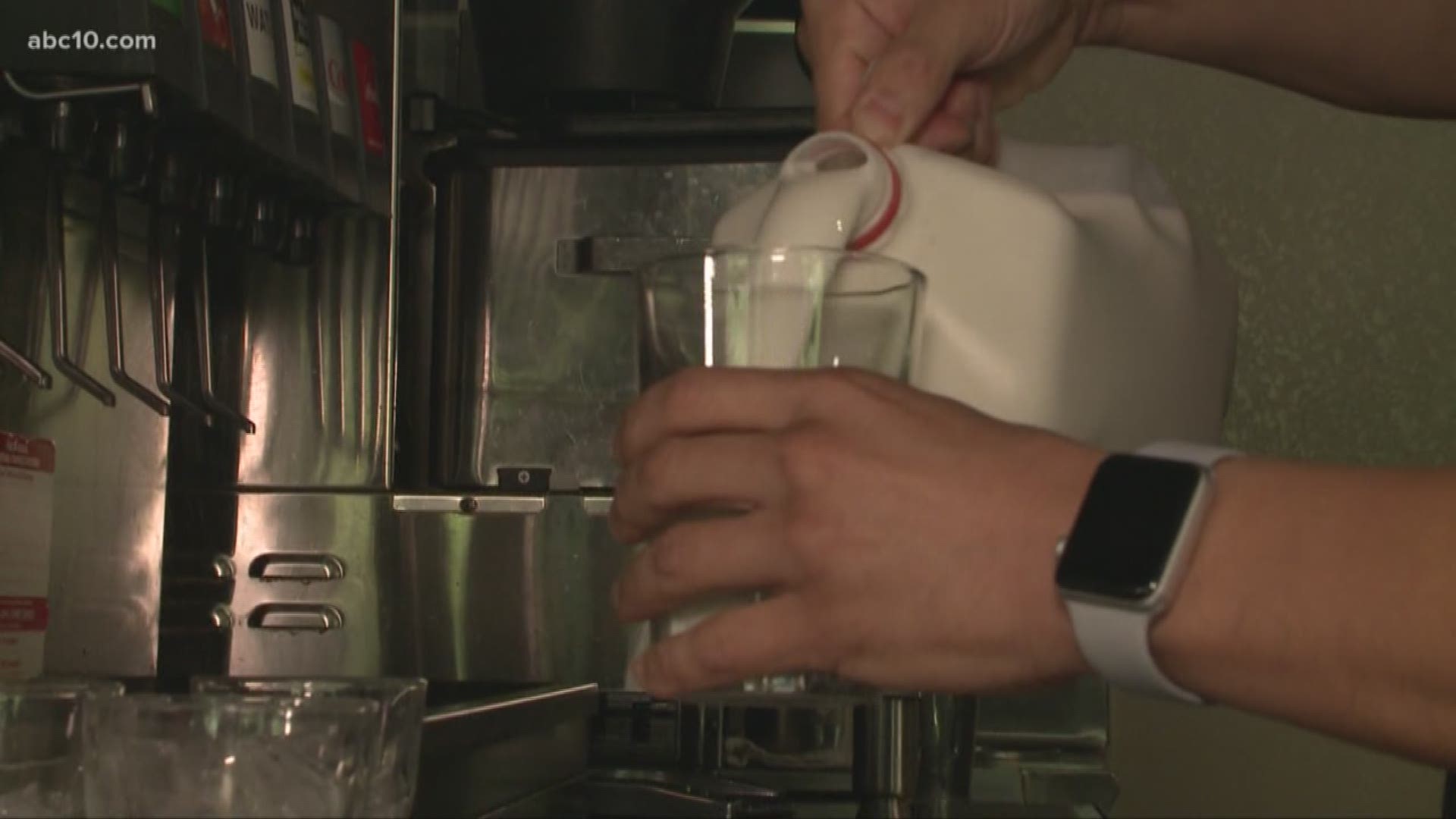 The law says if you don't specify what you want to drink for your kids meal - they'll default with water or milk.