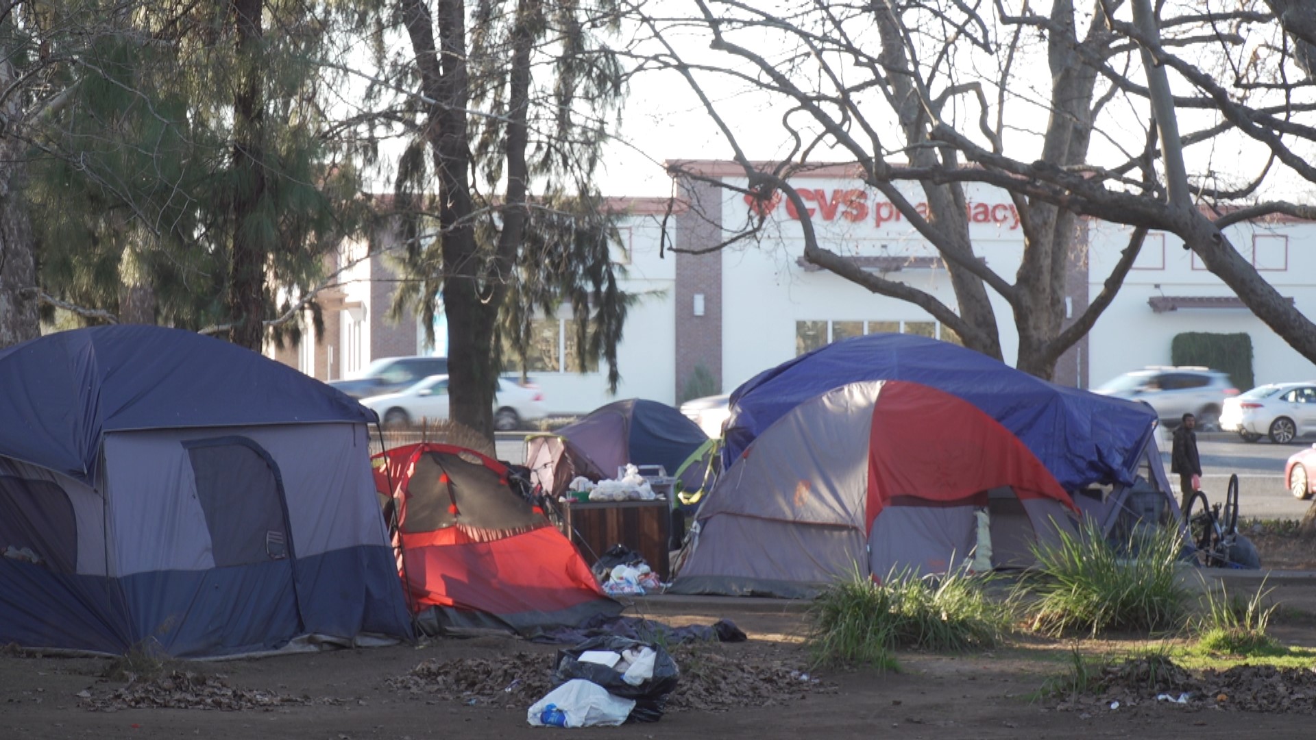 The District Attorney's office says it has not initiated legal action, but rumblings of a lawsuit has unhoused advocates alarmed.