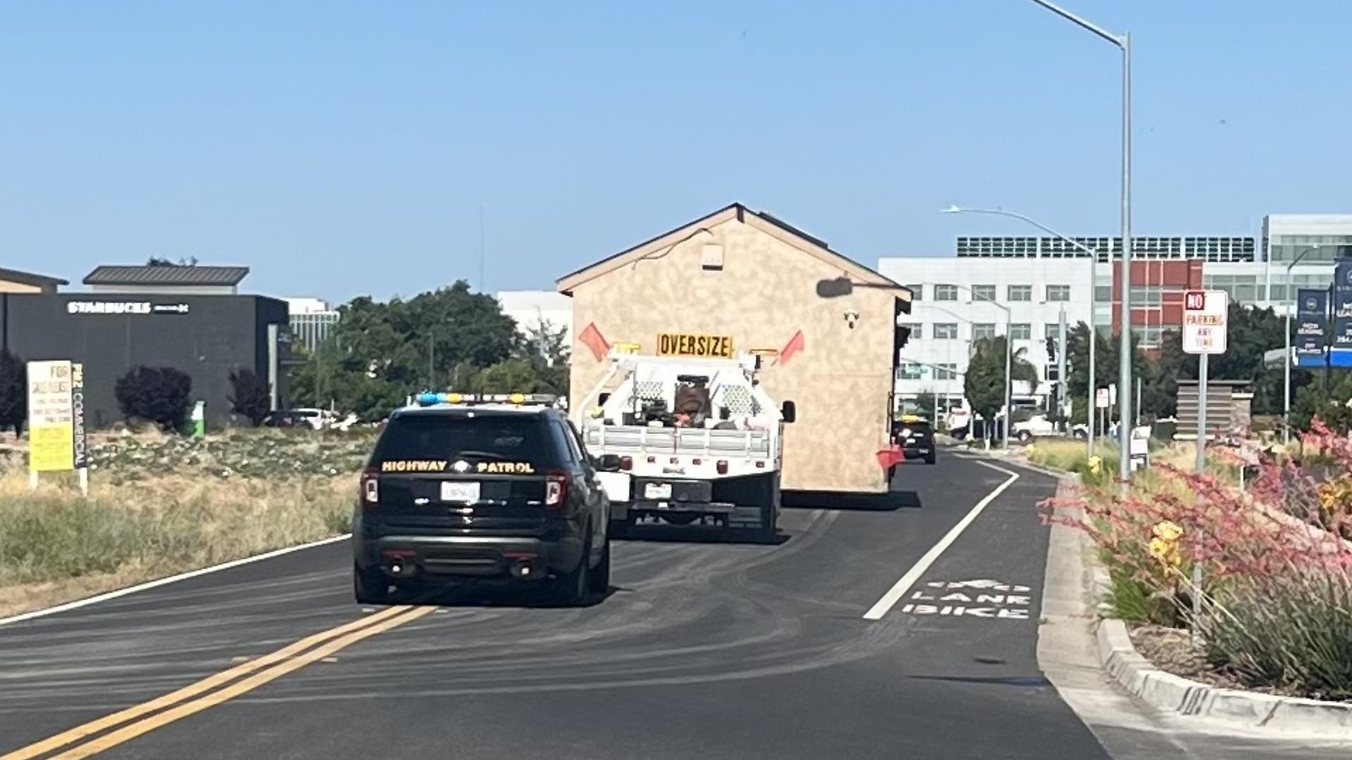 The Redwood Cafe hit the road, being dropped off in Lathrop as its new home continues to be developed.