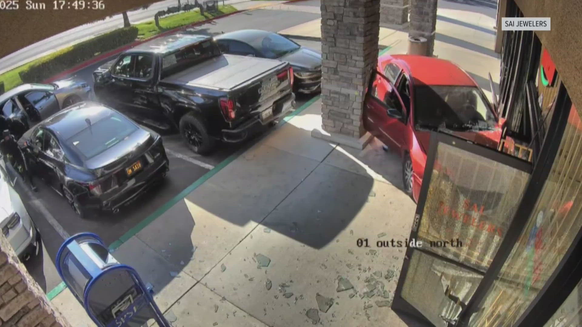 Four people have been arrested and at least a dozen more are still wanted after a smash-and-grab robbery at a Modesto jewelry store.