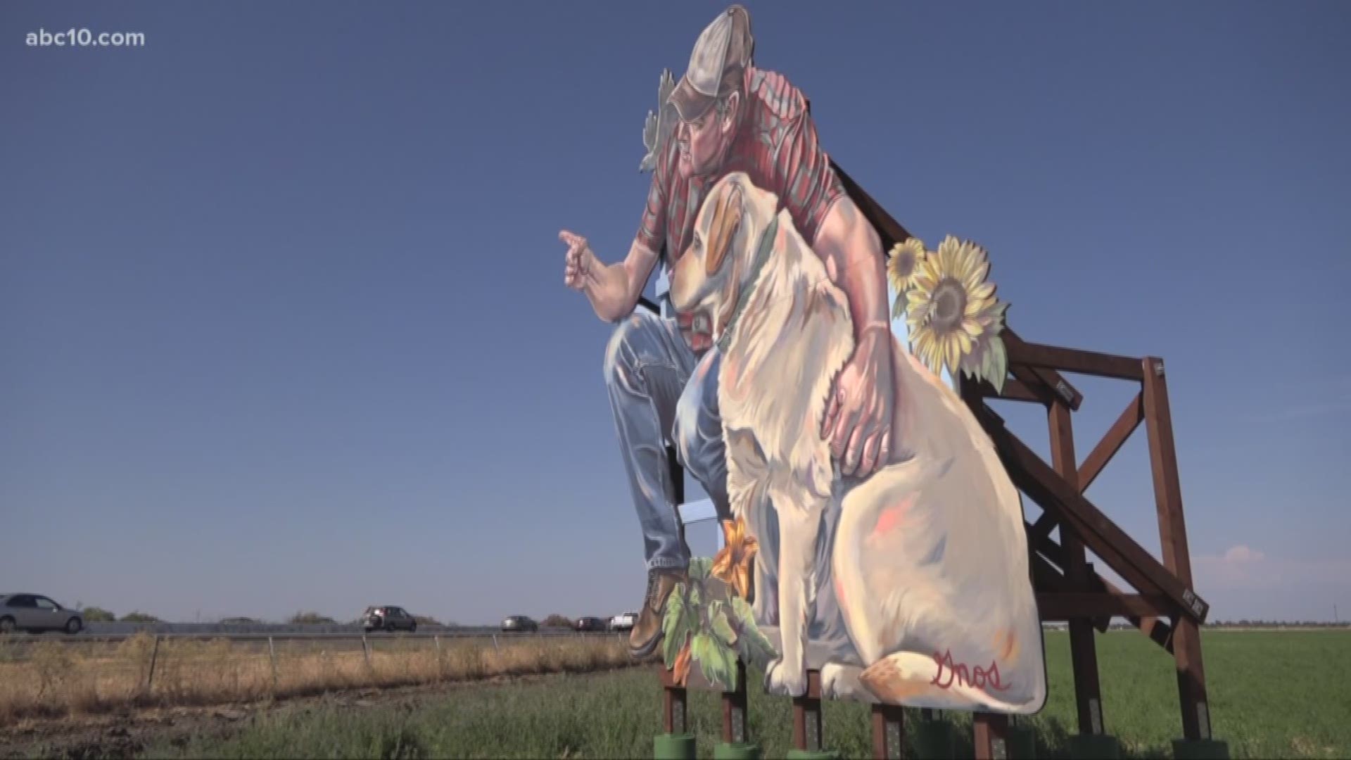 The 20 foot by 20 foot mural of a Solano County farmer and his dog can be seen from hundreds of feet away.