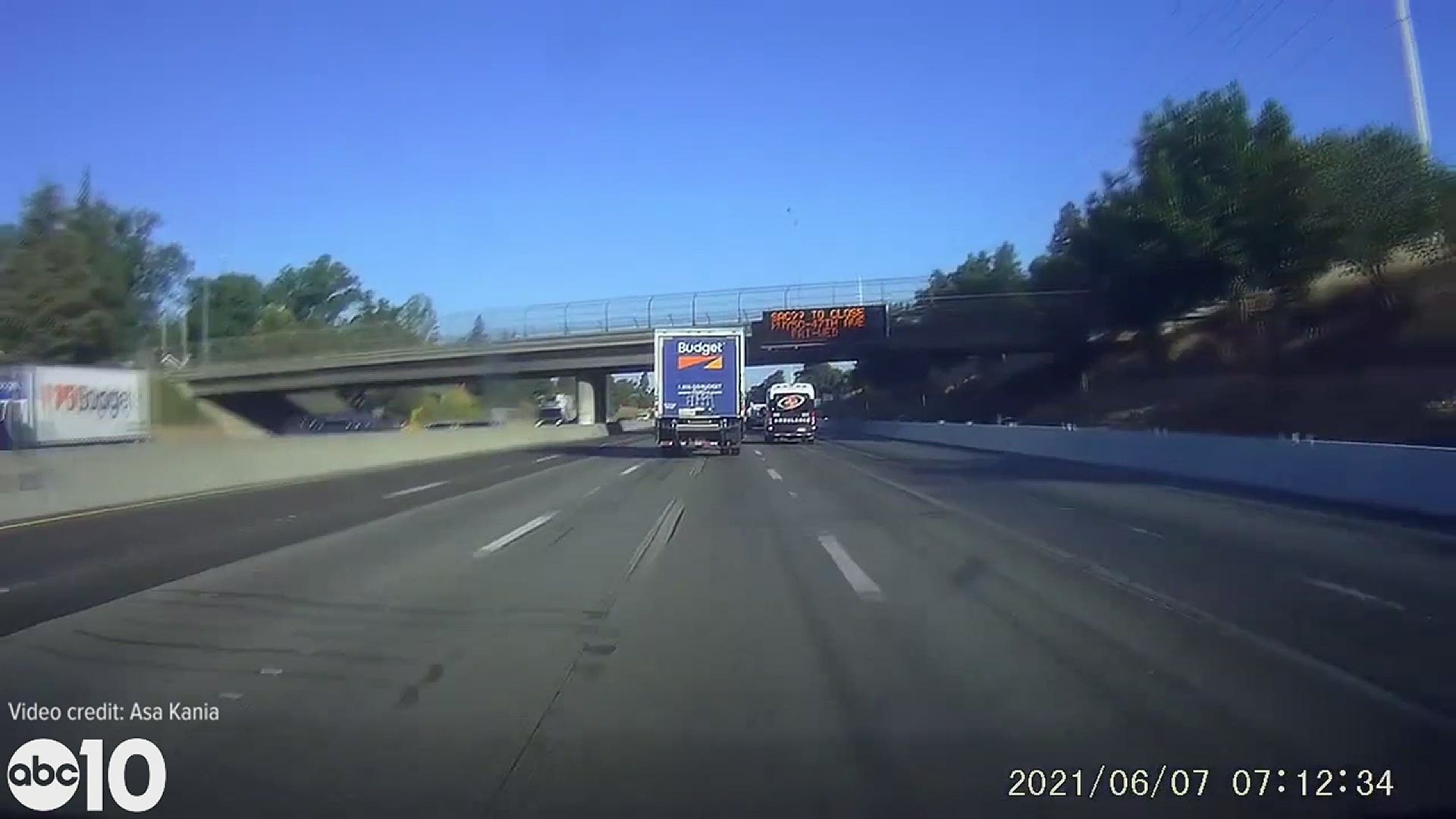 Asa Kania was driving along Hwy. 50 Monday morning and captured the moment a private ambulance crashed into a truck with their dash camera.