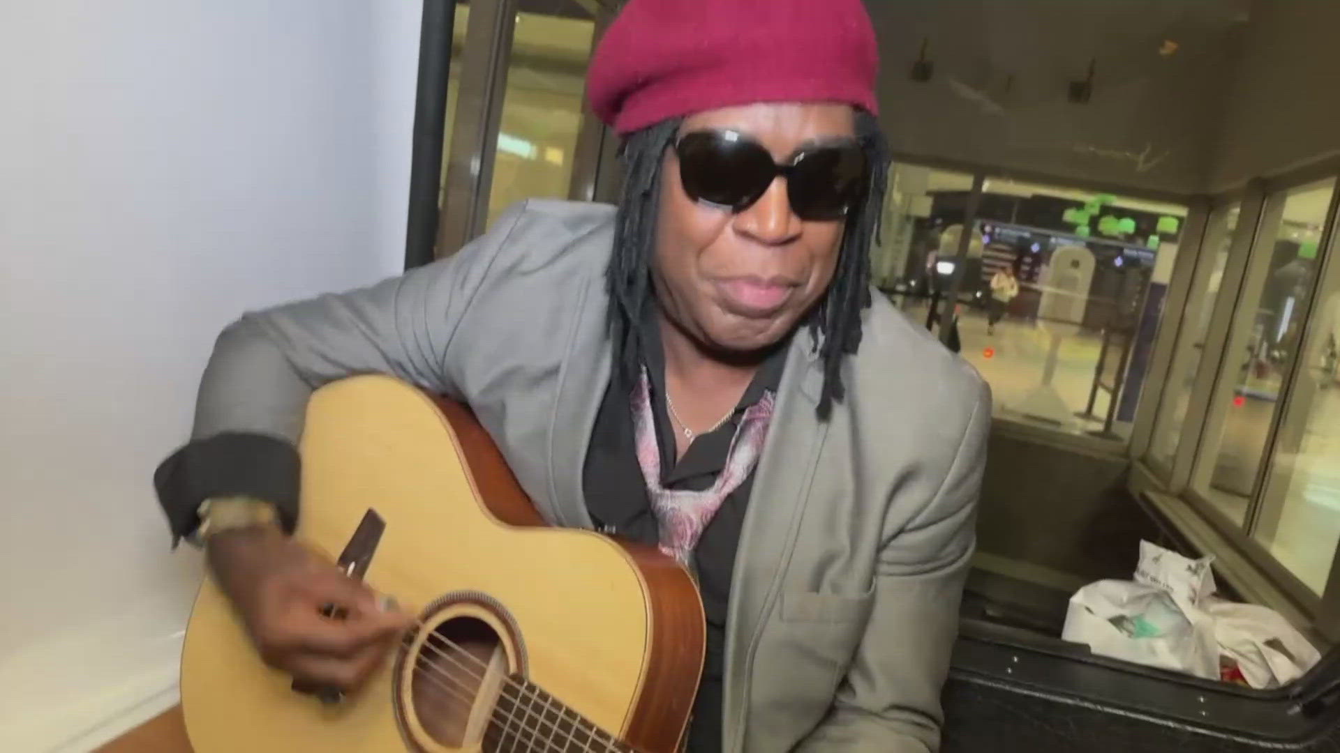 Sacramento travelers packed in the tram at Terminal B got a special gift of song from a local musician before flying out to their holiday destinations.