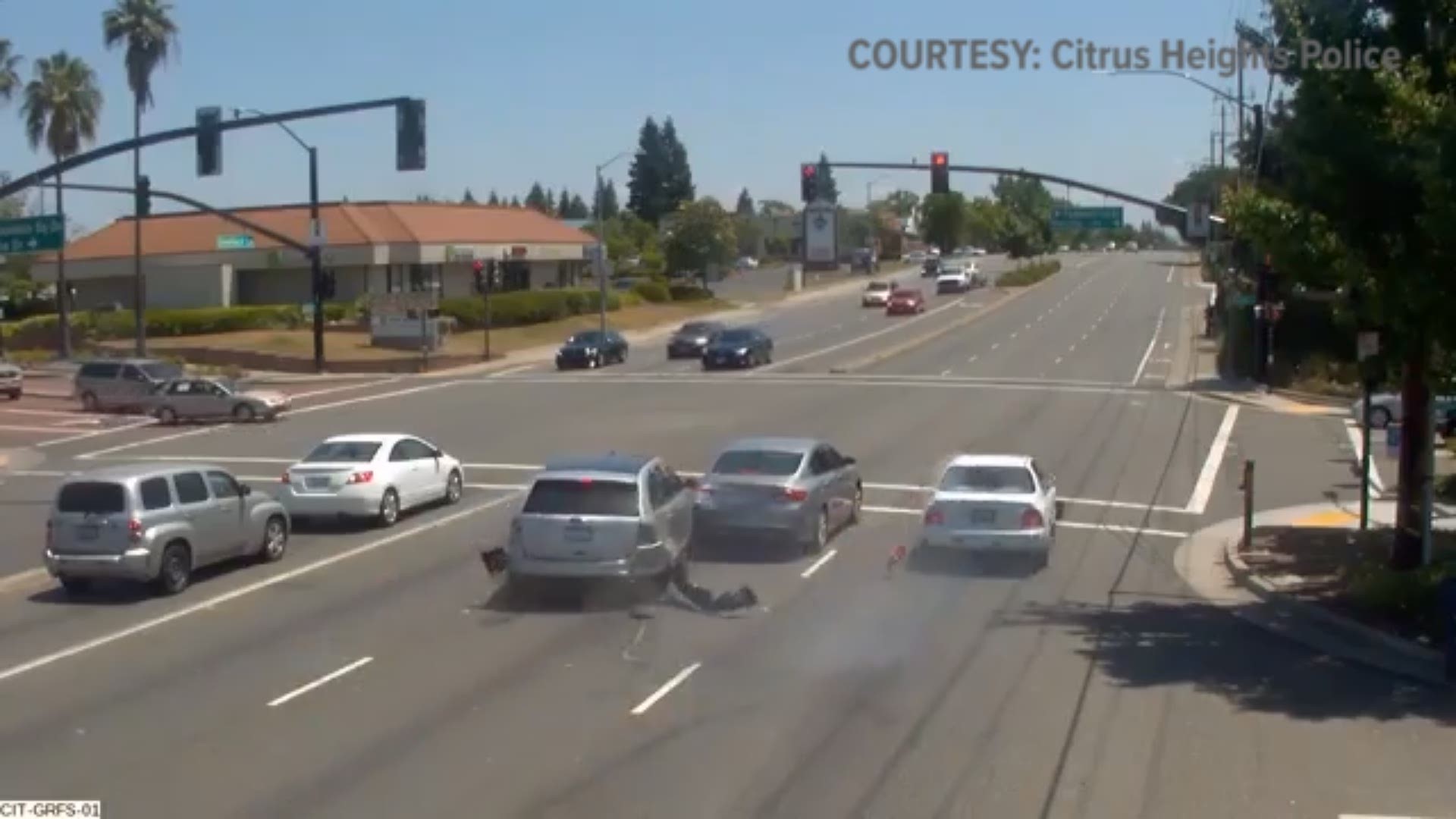 The montage video shows multiple drivers running various red lights.