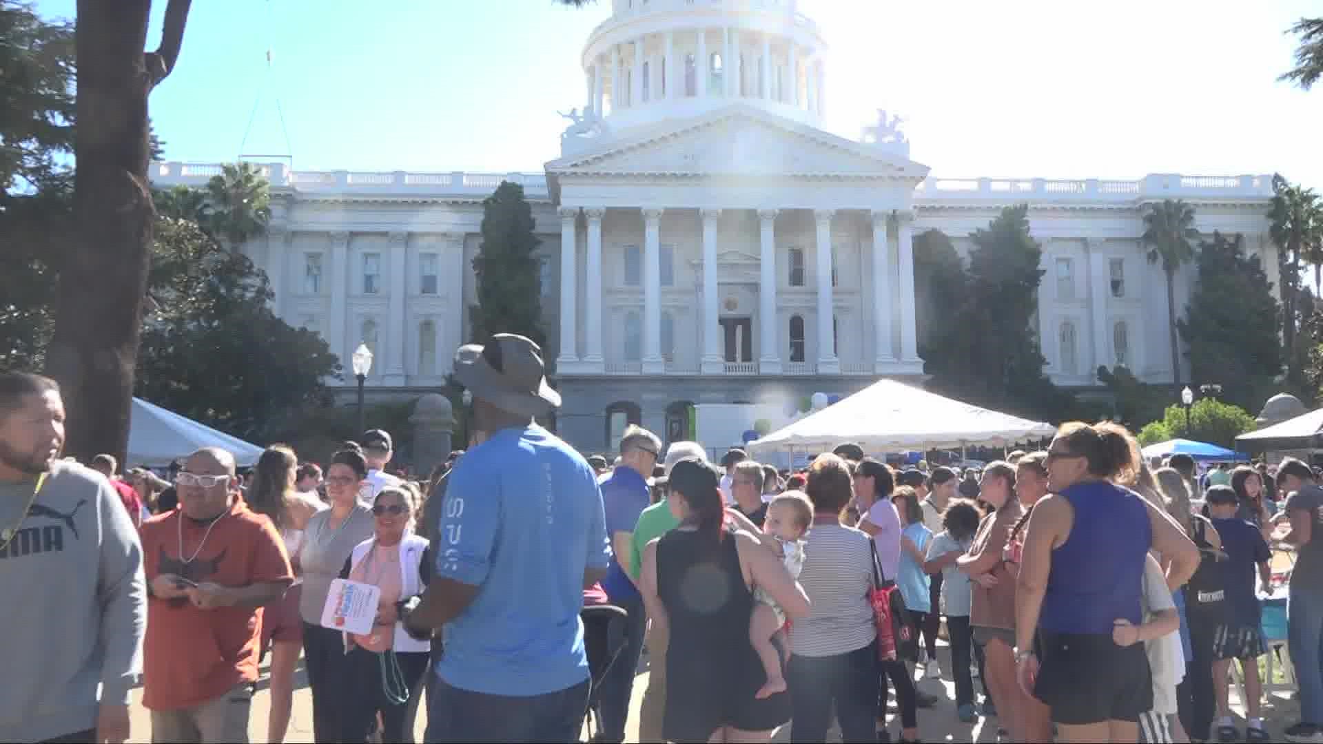 Hundreds of people who lost loved ones to suicide showed up at the Capitol to take part in the 'Out of the Darkness' walk through downtown Sacramento.