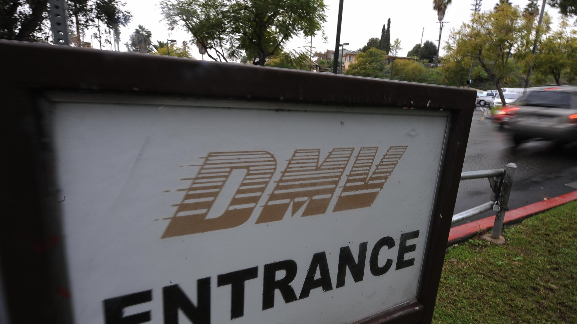 California's DMV is trying to improve customer service by accepting credit cards, upgrading its website and offering clearer instructions on how to obtain a new federally mandated ID, but Gov. Gavin Newsom cautioned Tuesday the agency's long wait times and other troubles aren't over.