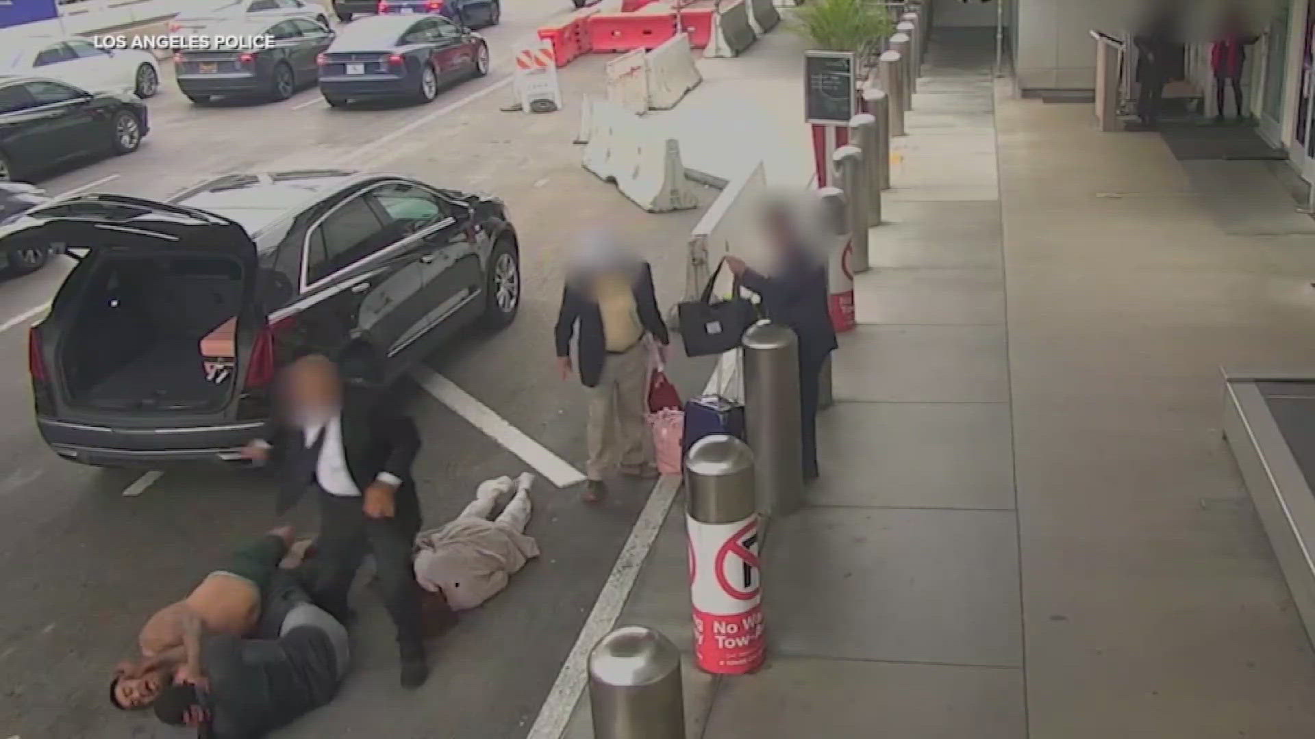 A woman was knocked out in May after two men were fighting at LAX.