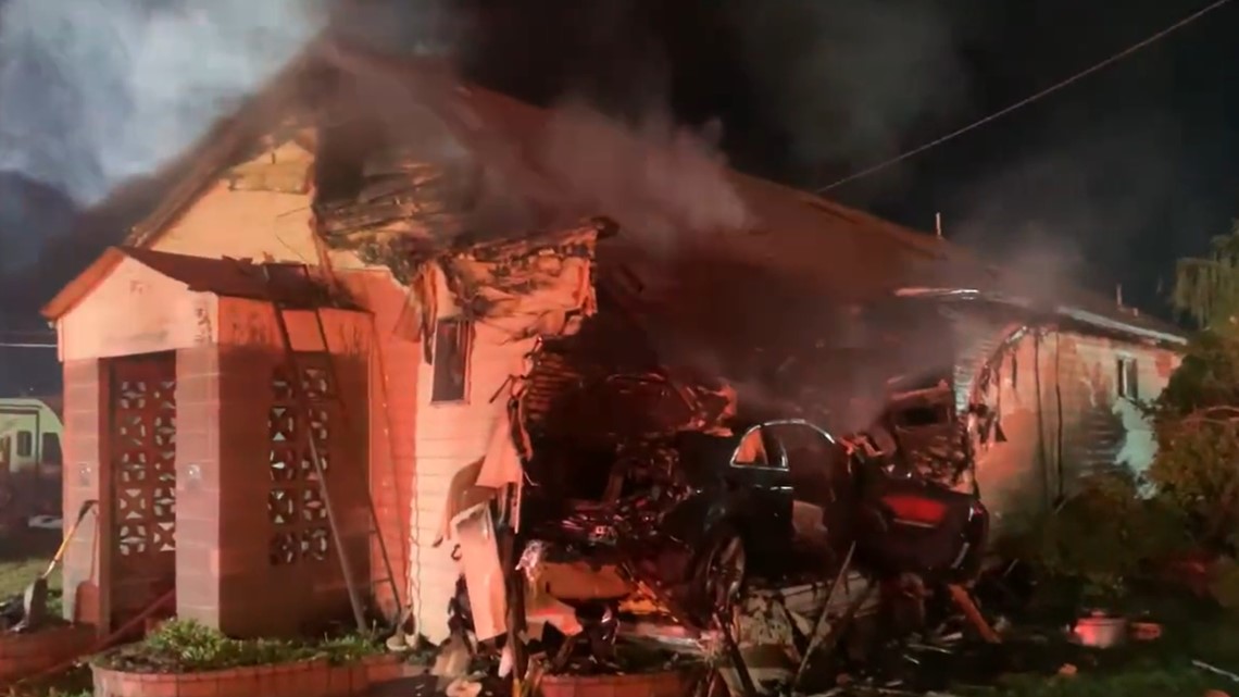 Two injured after car crashes into home causing fire | abc10.com