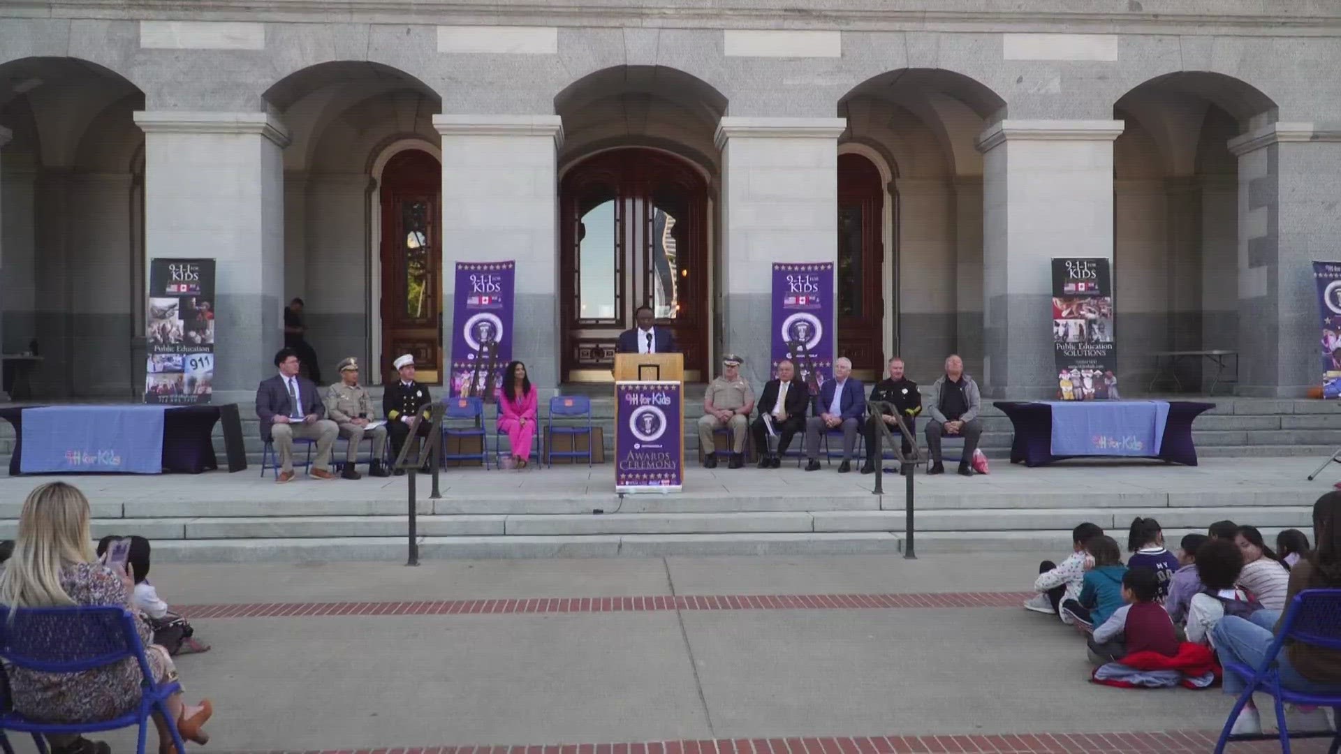The event was held in Sacramento to honor children who called 911 in an emergency and saved lives.