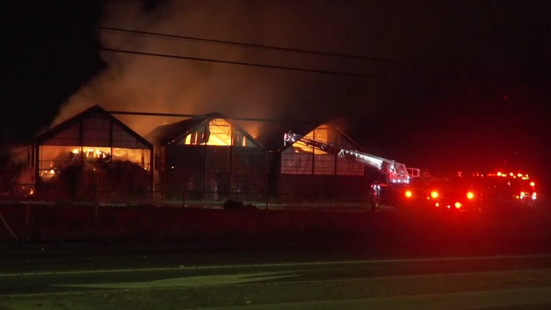 Firefighters are battling a large blaze on E. Gibson Road and Country Road 102 in Woodland.