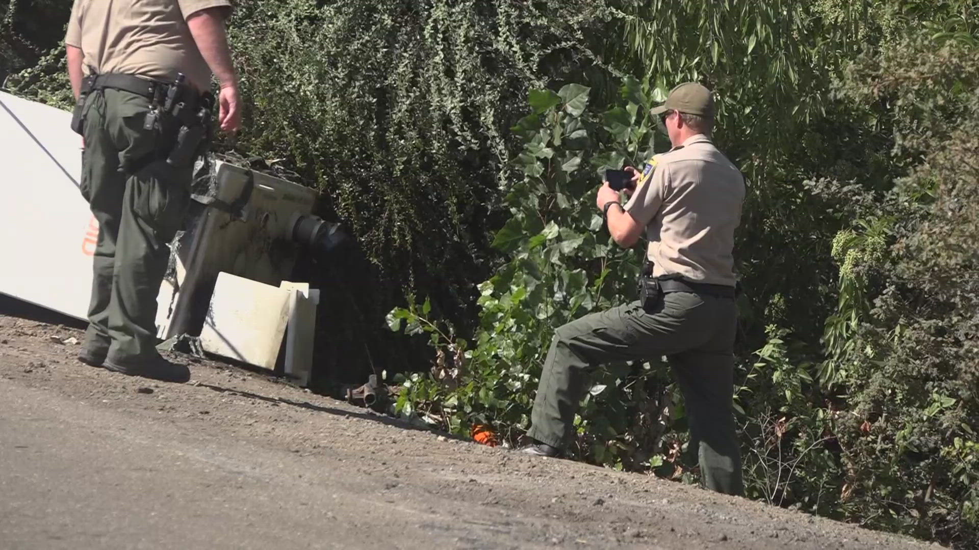 The oil and fuel reached nearly a mile-long stretch of the Smith Canal before officials could contain it.