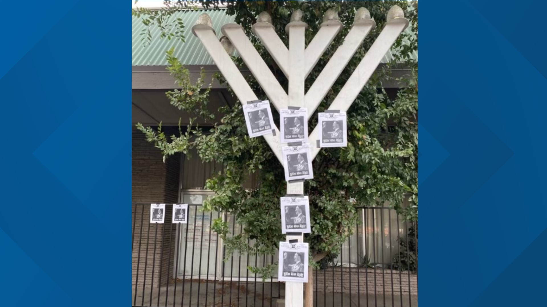 Numerous “Aryan Nation” posters depicting Adolf Hitler were plastered across the front of a menorah and along the front of the small worship center.