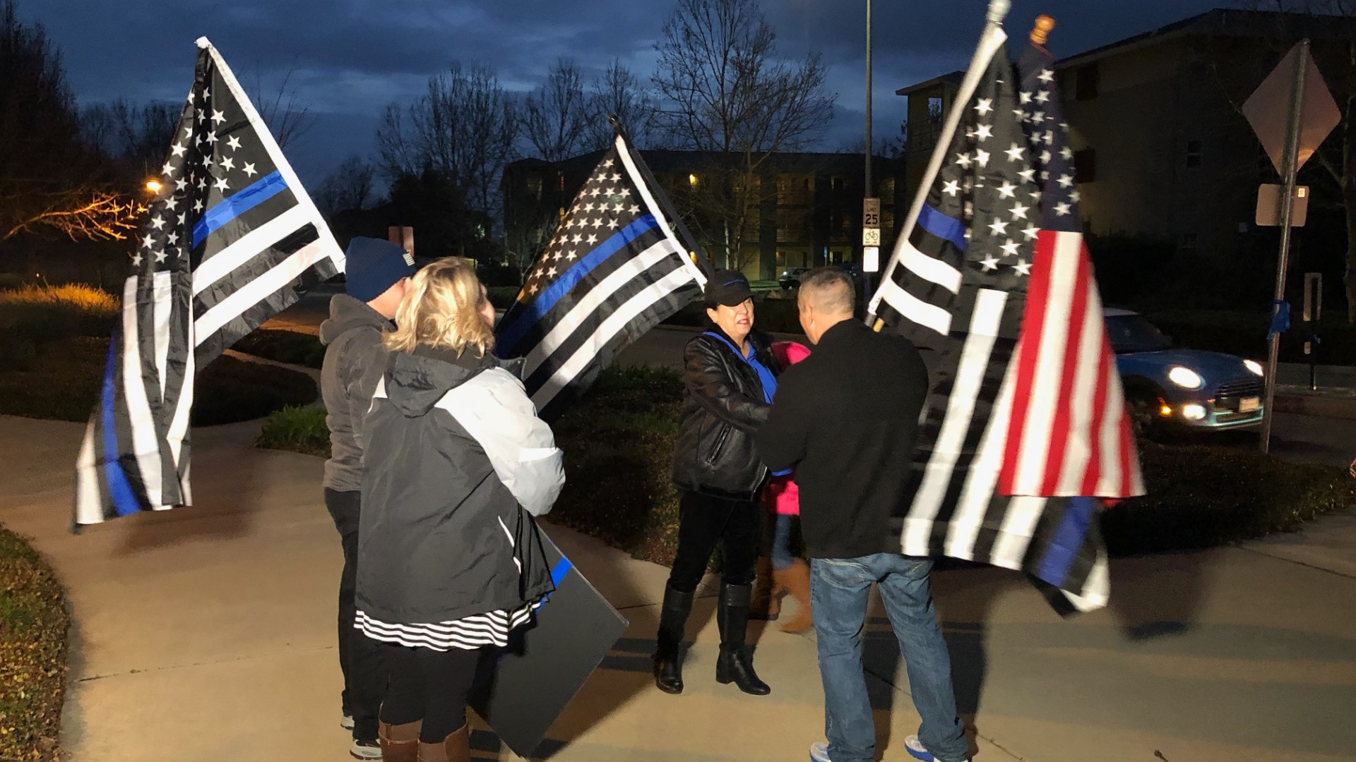 On Thursday night, on the eve of Officer Natalie Corona's funeral, a small group gathered to show their support for law enforcement. They gathered on the corner of Cantrill Drive, named after the first Davis Police Officer to be killed in the line of duty in 1959, Douglas Cantrill.