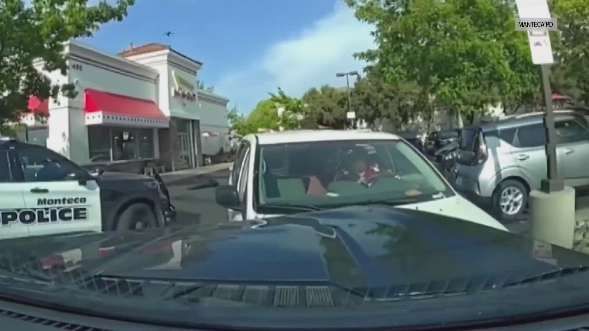 Manteca police released footage of an April shooting of a man after he allegedly rammed patrol cars at an In-N-Out Burger.