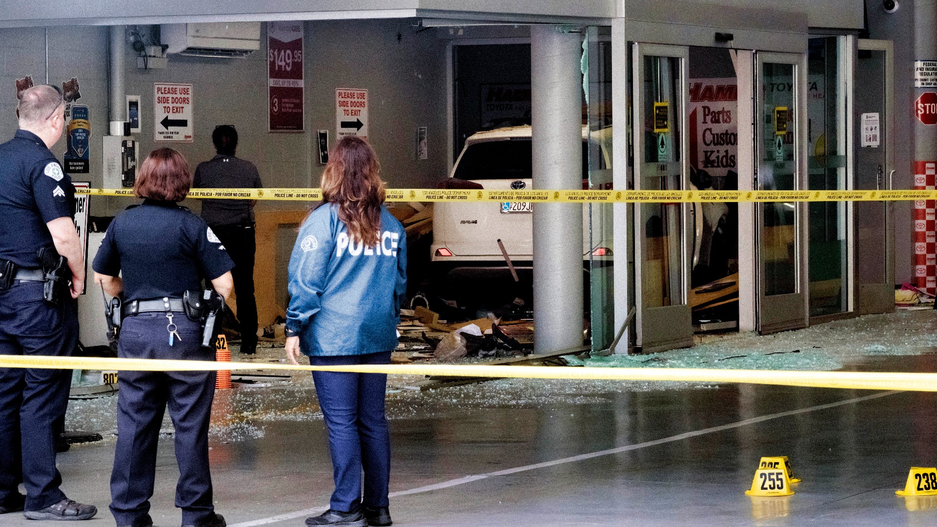 Vehicle strikes 3, killing 1 in Los Angeles car dealership