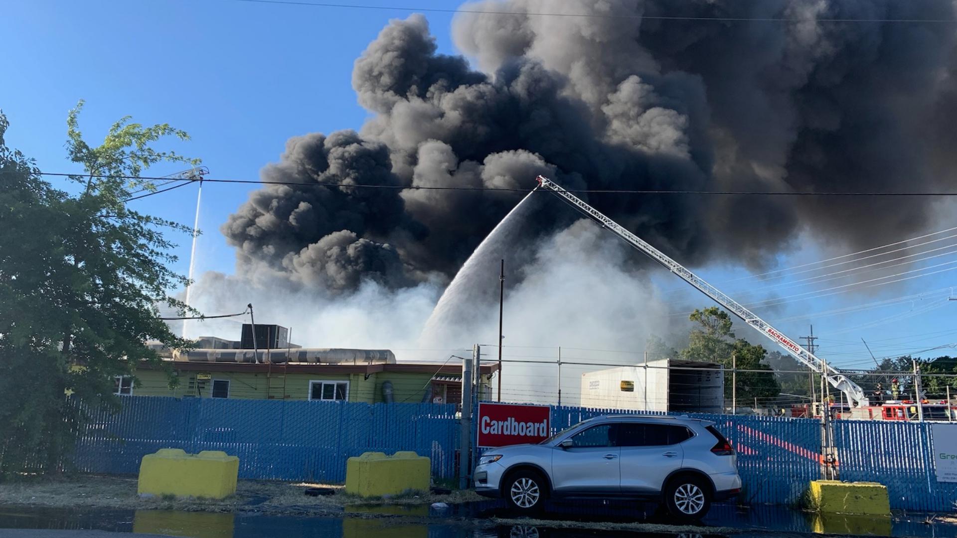 The Sacramento Fire Department says they're battling the large fire at a recycling facility on Florin Perkins Road and 24th Avenue around 5 p.m.