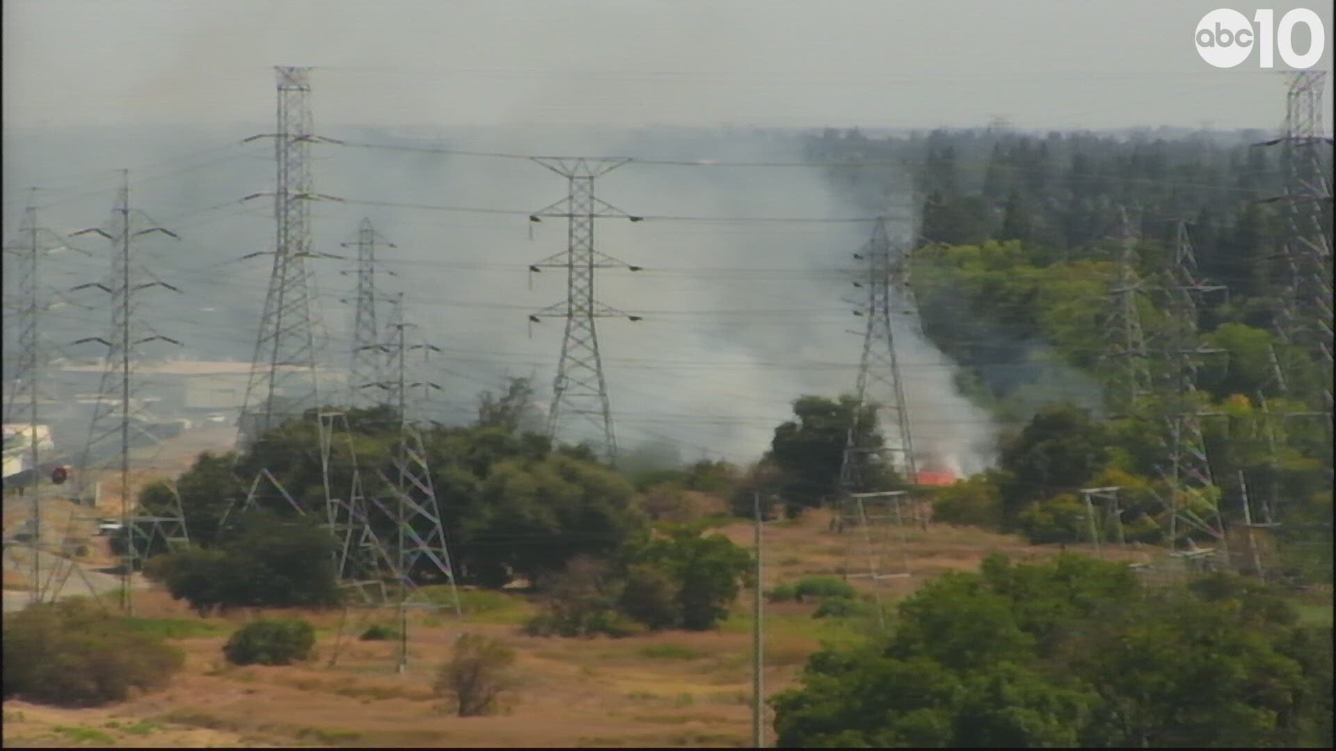 The two alarm grass fire is located along the lower American River Parkway and in a heavy vegetation area.