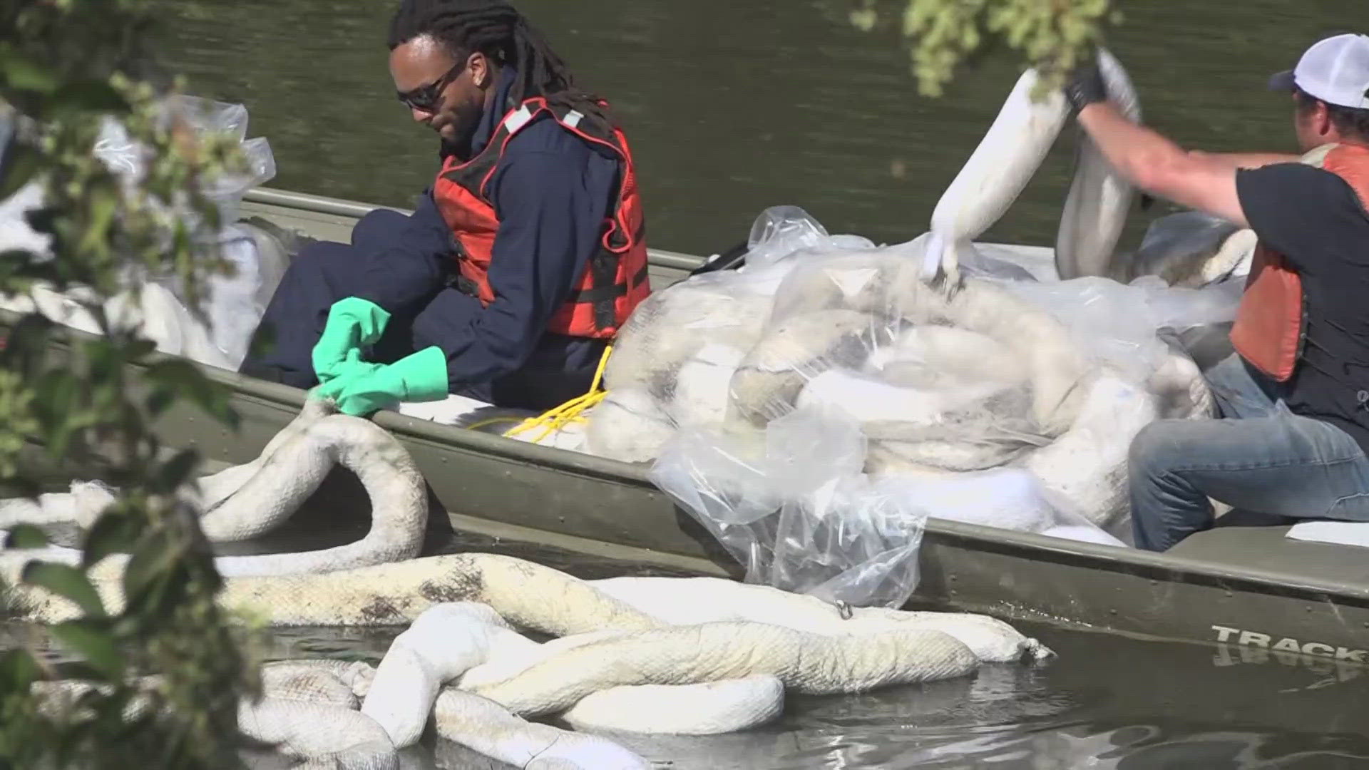 State and federal crews return to Stockton's Smith Canal for a fifth day after an illegal dumper caused an oil spill.