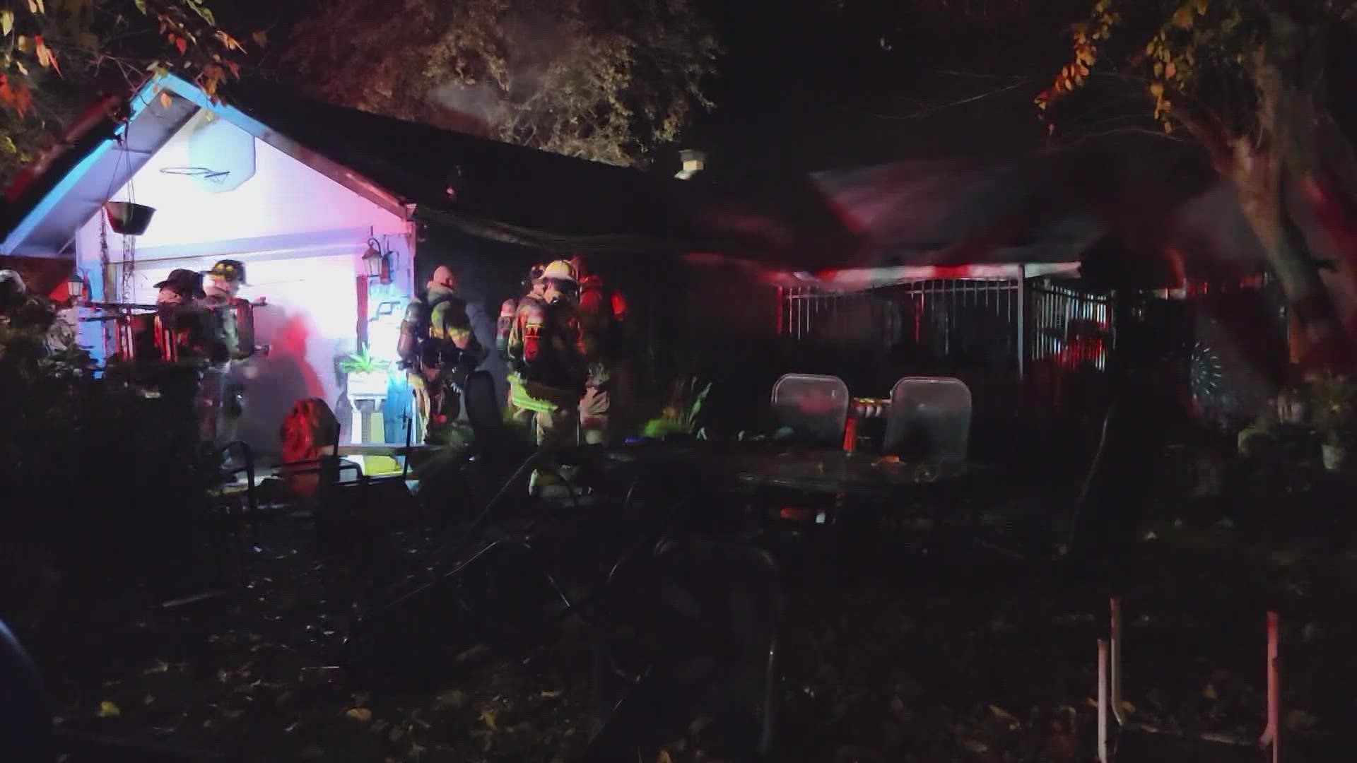 Sacramento Metro fire crews rescued one victim from inside the burning home after two were able to exit on their own.