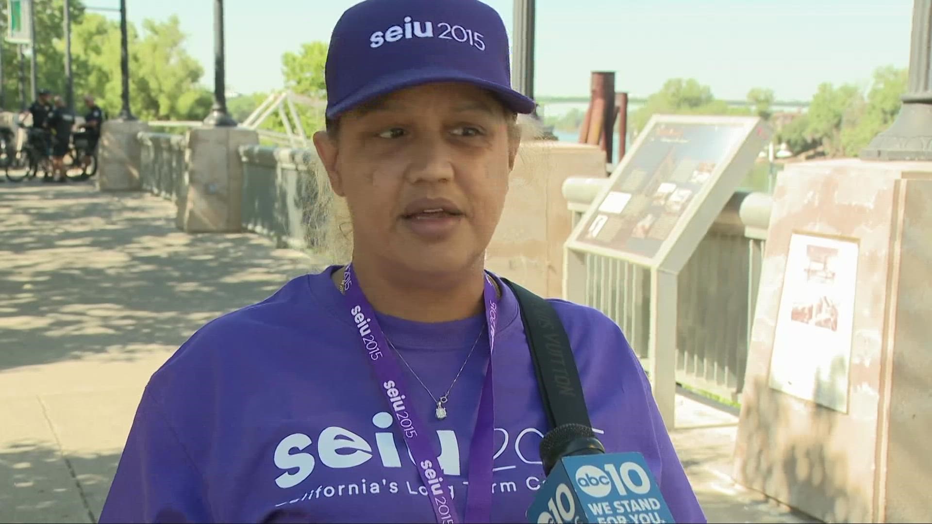 Current and former nursing home workers marched across the Tower Bridge into West Sacramento in demand for better wages to compensate for staffing shortage