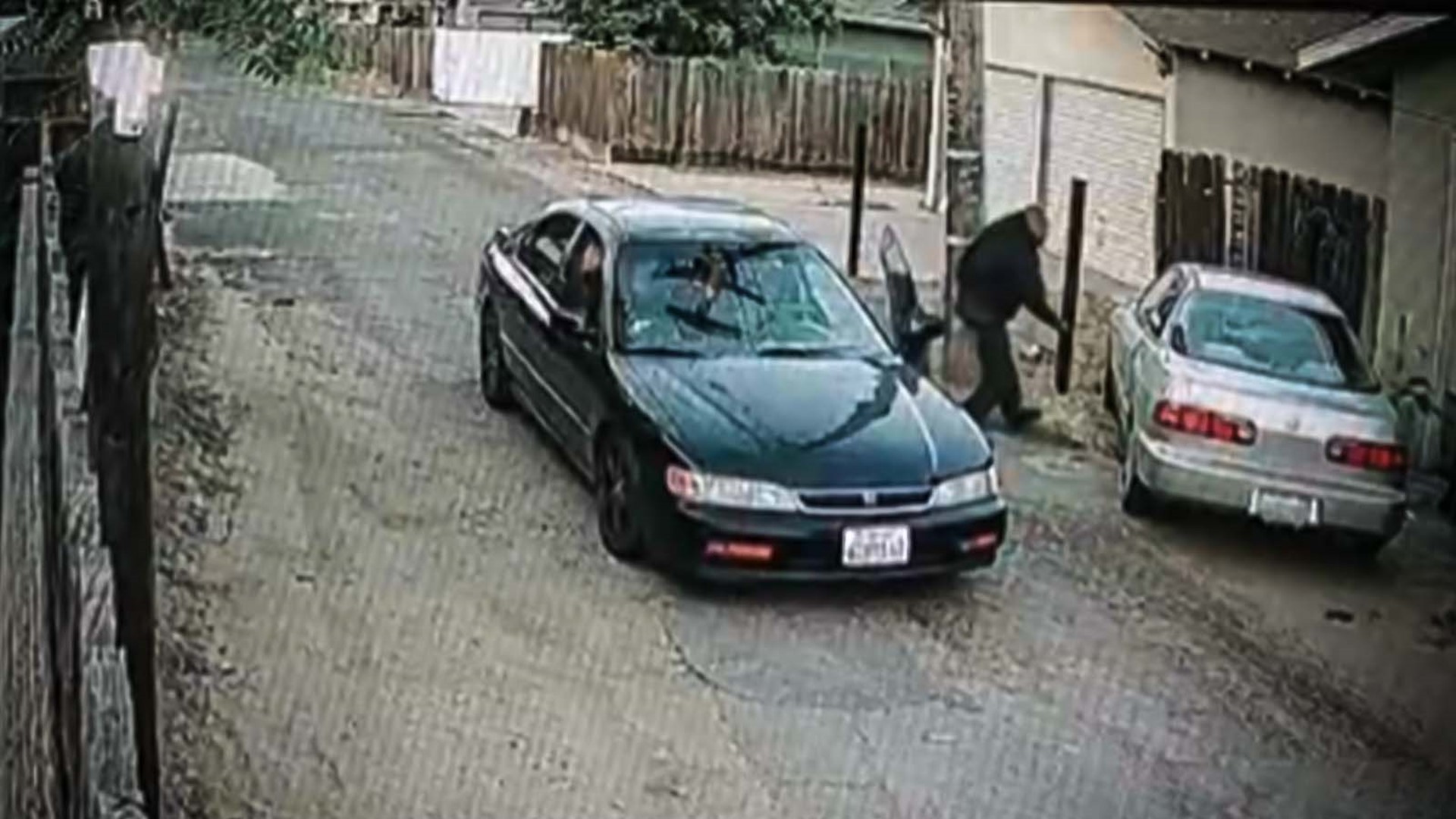 On Sunday morning near Scenic Drive and the cemetery, a security camera caught two men in an alley where the car was parked. They got out and quickly stole it.