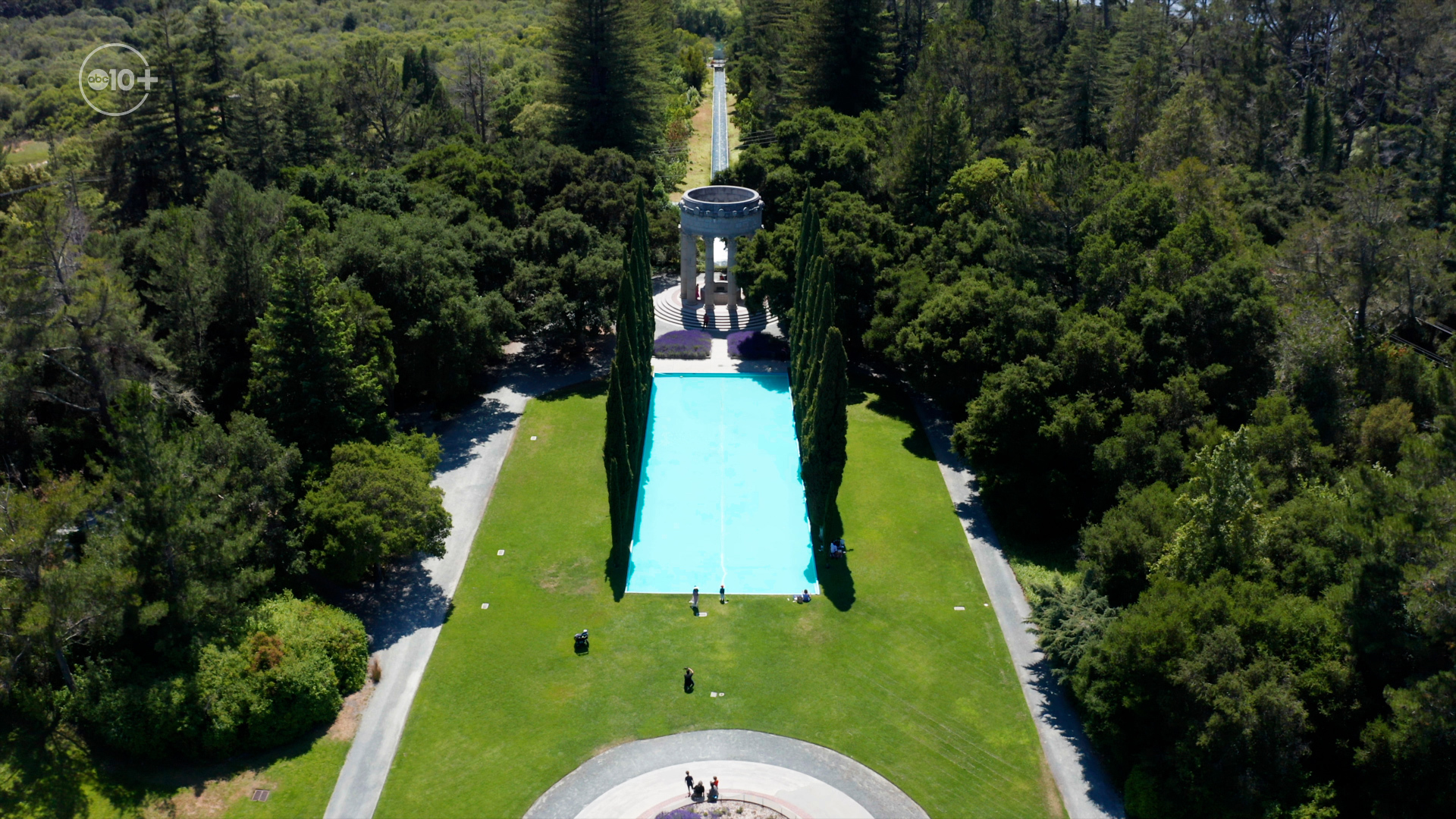 Hiding on a hilltop in a small forest is a Parthenon-style monument surrounded by a well manicured lawn and a pool of mountain fresh drinking water.
