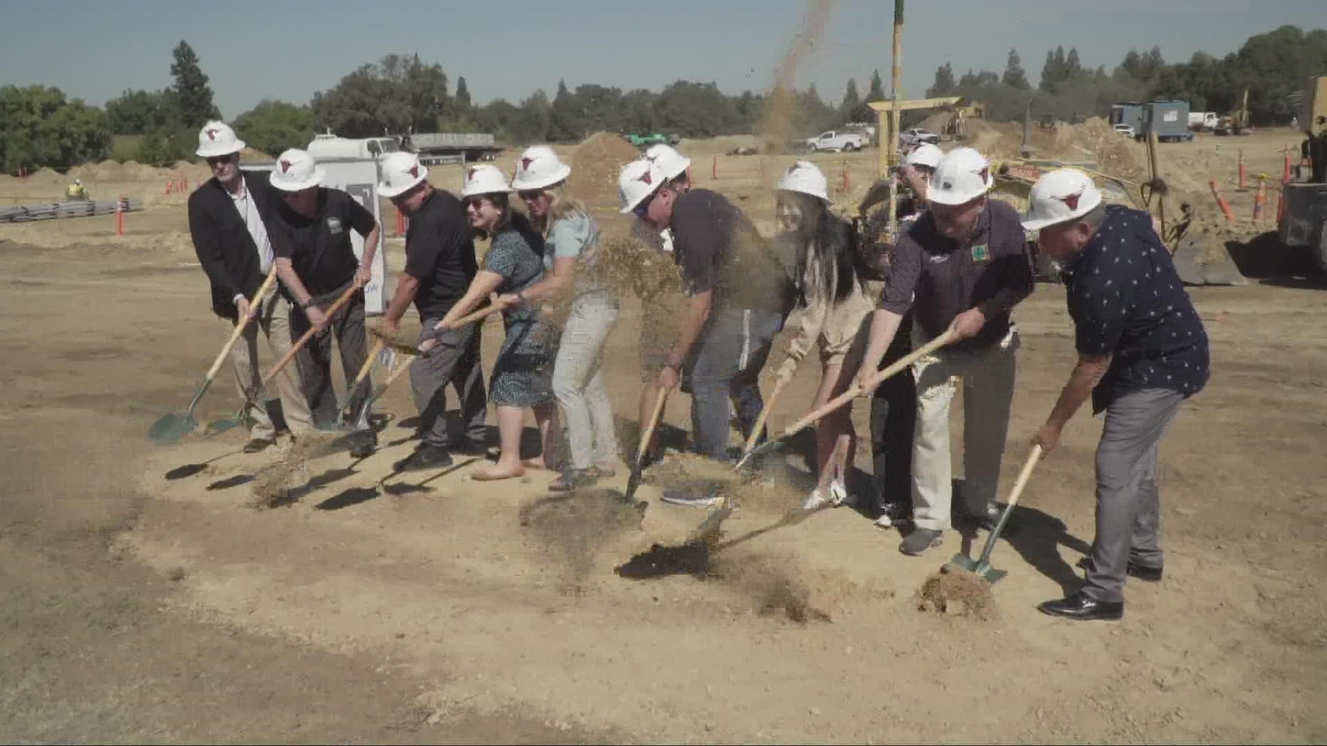 Students, staff and families with the high school celebrate on Tuesday the groundbreaking of a new sports stadium in Citrus Heights for Mesa Verde High students.