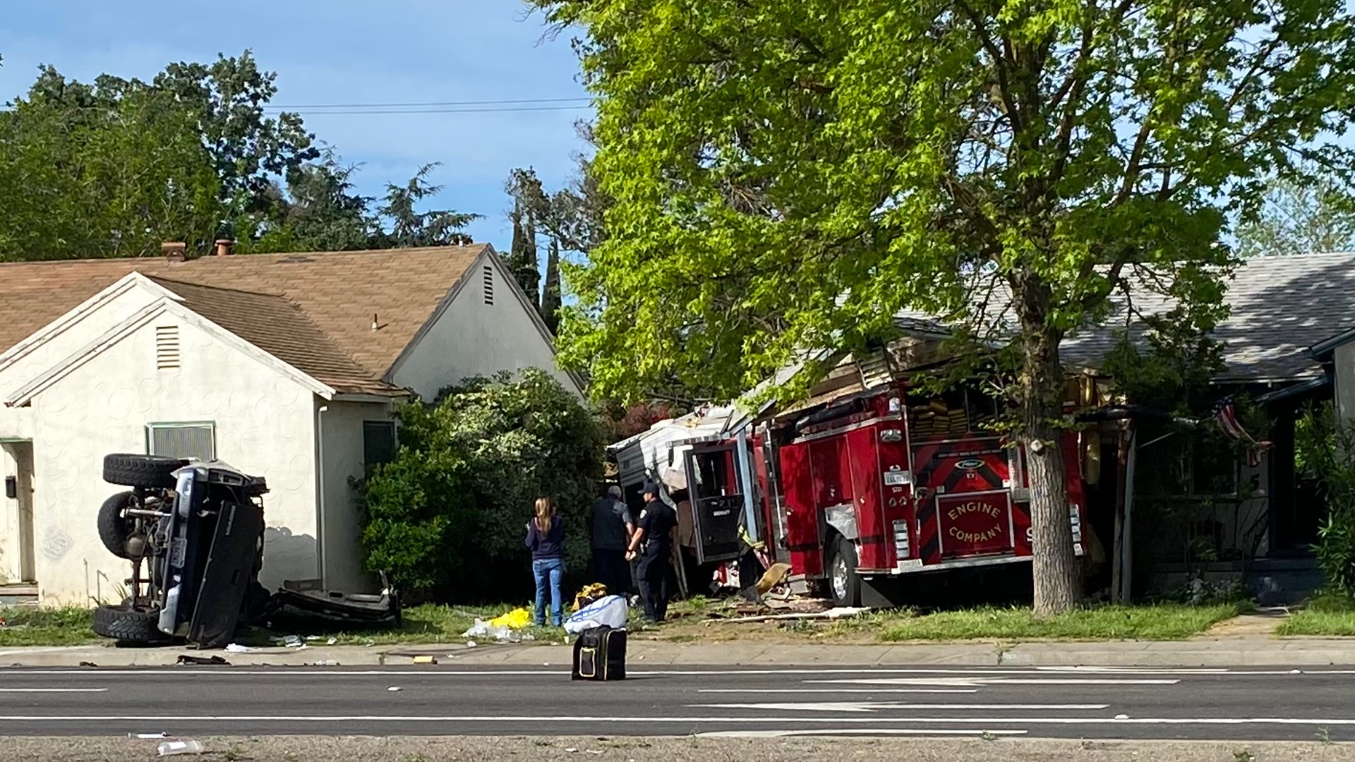 One person was critically injured in a multi-vehicle crash that caused a fire engine to slam into a Stockton home.