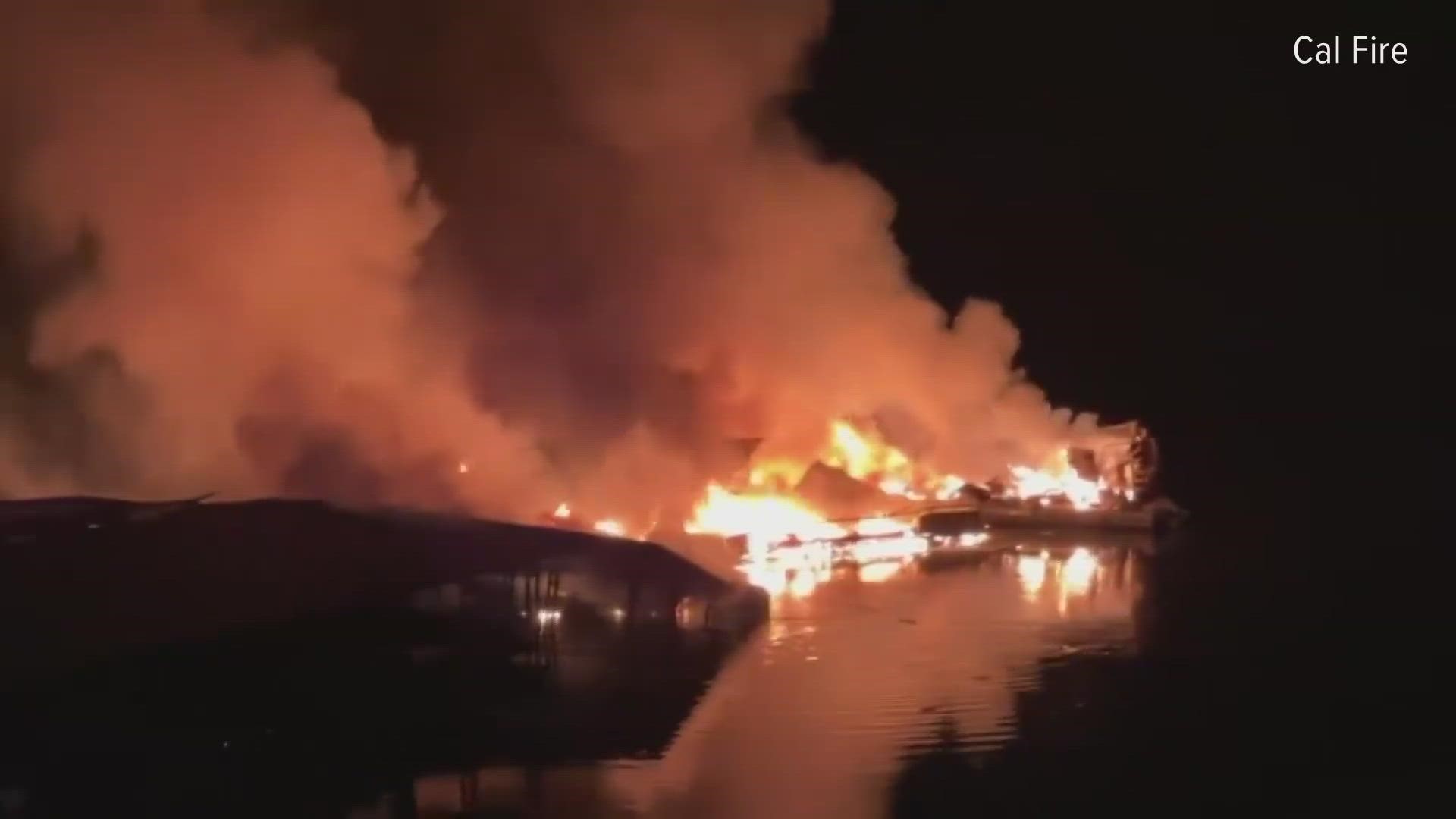 Officials say approximately 10-20 boats, jet skis, houseboats and the dock are on fire.