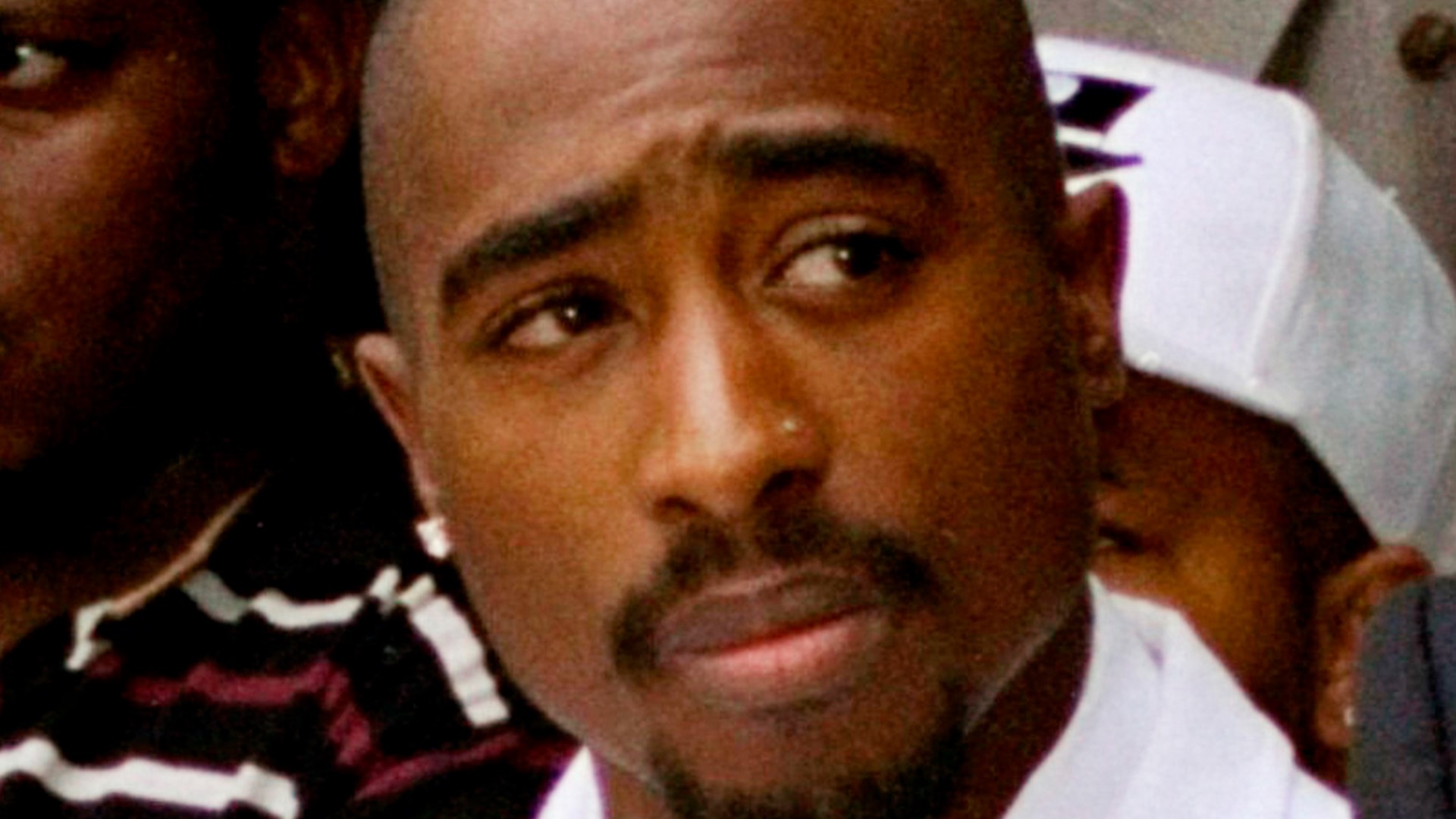The suspect has himself admitted in interviews and in his tell-all memoir that he was in the car where the gunfire erupted from when Tupac Shakur was killed in 1996.