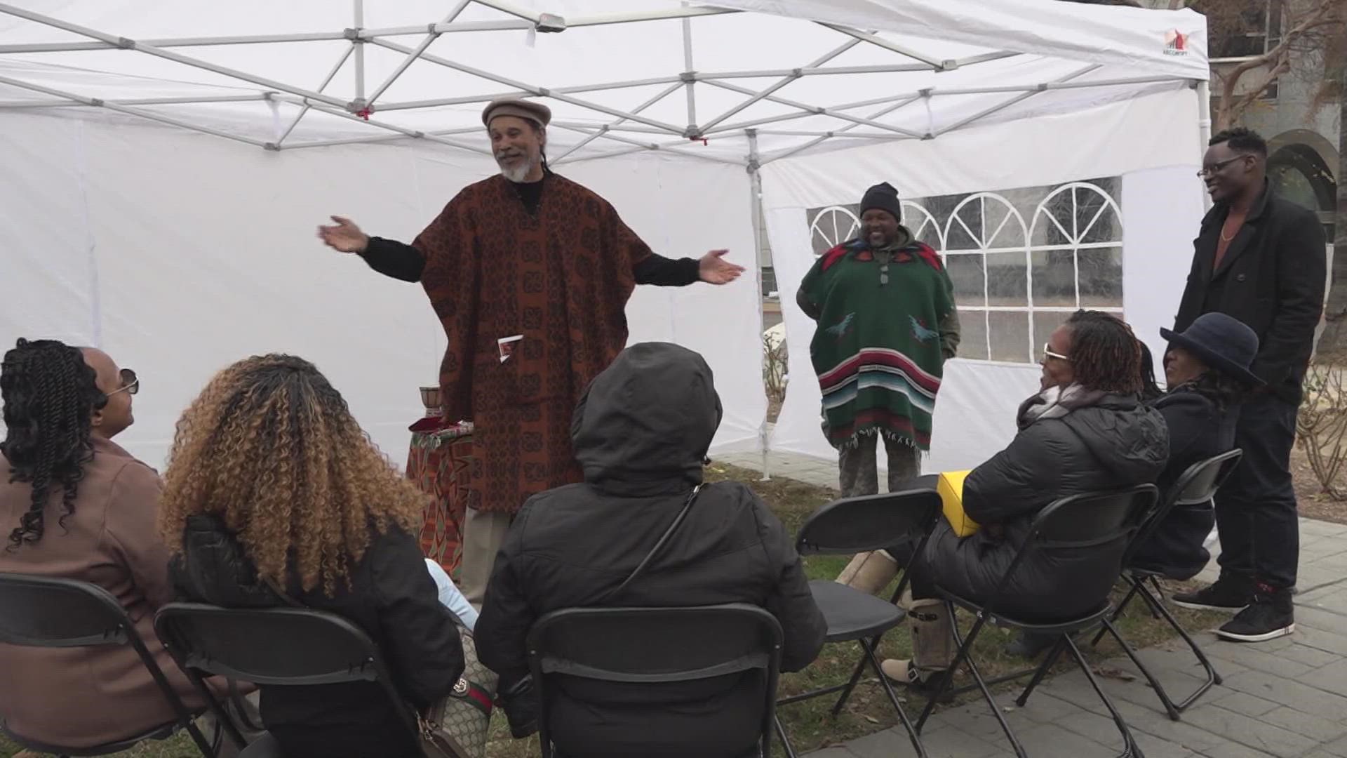 Sacramento residents came together to light the first candle on the first day of the 7-day Kwanzaa celebration.