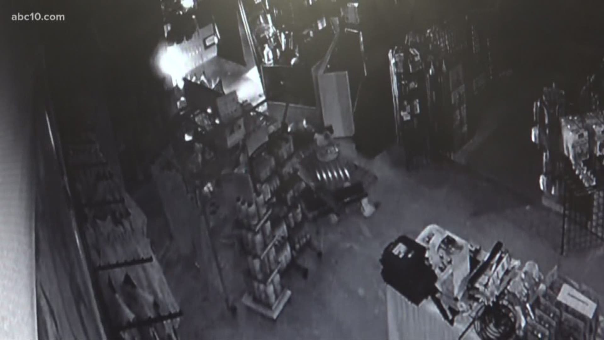 The supply store security camera shows the moment a man and a woman smash a white stolen van into the supply store then jump out and start frantically throwing the merchandise into the vehicle.