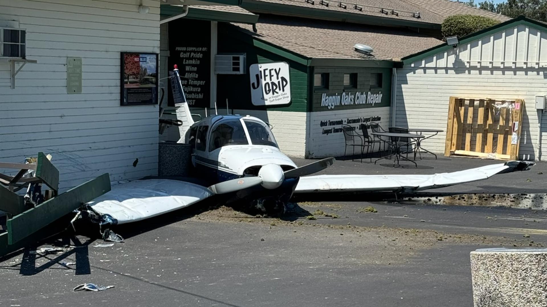 Security video shows the moments a plane crash at the Haggin Oaks Golf Complex in Sacramento, narrowly missing a golfer on the practice green.