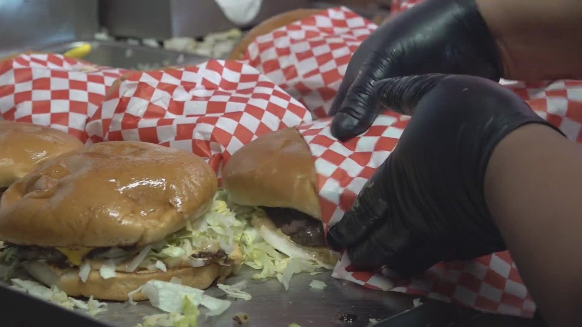 Former employees and passionate customers were saying their final goodbyes to Lou's Burgers over lunch Saturday.