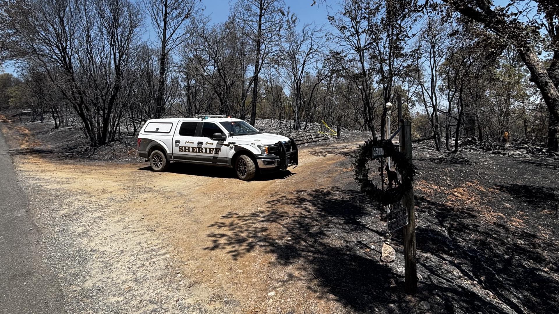 Neighbors and friends say the woman was a German shepherd breeder who didn't want to leave her puppies behind in the fire.